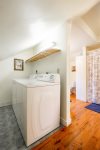 Master suite en suite tub-shower bathroom and laundry